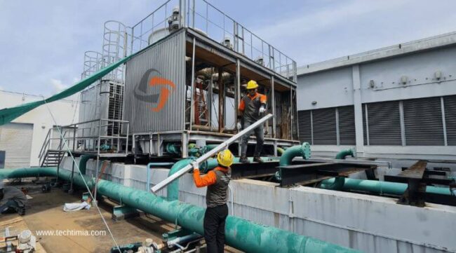 ACMV cooling tower maintenance ACMV air handling unit with ductwork inside commercial facility Singapore