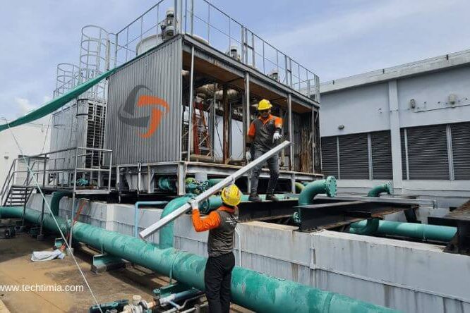 ACMV cooling tower maintenance ACMV air handling unit with ductwork inside commercial facility Singapore